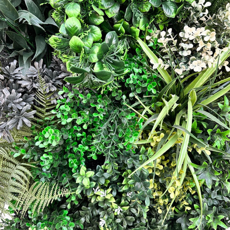 Artificial 3D plant wall with lush dark and light green foliage, yellows and whites 100x50cm