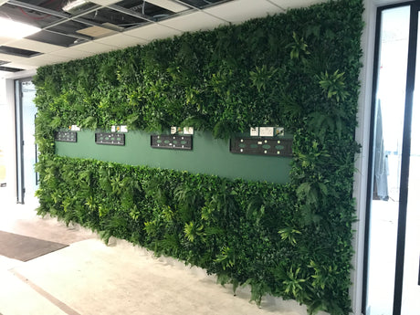 Artificial green wall panel with variegated foliage ivy palms grasses and ferns 100x100 cm - www.greenplantwalls.co.uk